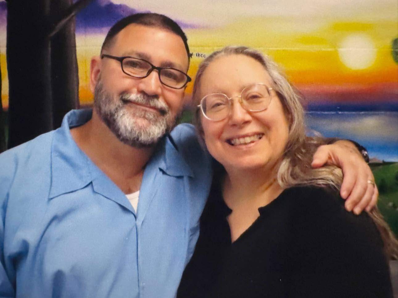 Tony and Lori Dameron smiling together, co-creators of From Conflict 2 Clarity